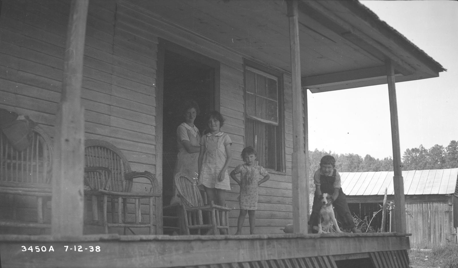 Children on the porch of a mountain farmhouse, 1938